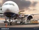 stock-photo-loading-cargo-on-the-plane-in-airport-view-thro[...].jpg