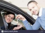 man-giving-car-keys-to-a-woman-CTDP14.jpg