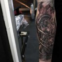 fiery-Roman-warrior-tattoo-mens-forearms[1].jpg