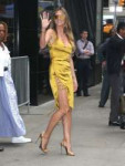 heidi-klum-long-legs-in-gold-high-heels.jpg