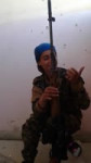 Kurdish female sniper dodges headshot; laughs it off.mp4
