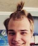 A-picture-of-a-young-balding-male-with-a-man-bun-hairstyle-[...].jpg