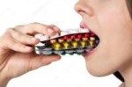 depositphotos118551960-stock-photo-girl-eating-lots-of-pills.jpg