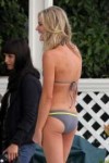 Rebecca Romijn wearing bikinis.jpg