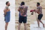 Ben-Affleck-showing-back-huge-tattoo-on-the-beach.jpg
