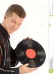 guy-holds-hands-vinyl-disk-2361654.jpg