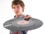 guy-plate-vinyl-nice-young-man-holds-record-hand-32027025.jpg
