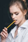 photo-woman-with-pencil-in-mouth.jpg