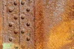 depositphotos29025003-stock-photo-rusty-metal-plate-with-ri[...].jpg