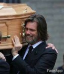 jim carrey carrying a coffin with gis gf, smiling.jpg