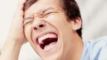 laughing-out-loud-young-man-face-closeup-outdoors-laughter-[...].jpg