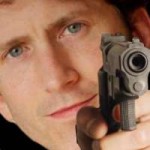 todd aiming at you with a pistol.jpg