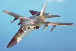 Anair-to-airleftfrontviewofanF-111aircraftduringarefuelingm[...].jpg