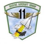 800px-MAG-11insignia.png