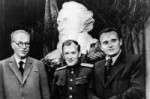 Mikhail Tikhonravov (middle) and Sergei Korolev (right).jpg