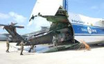 A U.S. Army Black Hawk helicopter is loaded aboard a Russia[...].jpg