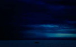 dark-evening-blue-cloudy-alone-boat-in-ocean-5k-pv-3840x2400.jpg