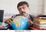 1-indian-man-government-employee-office-world-globe-watchin[...].jpg
