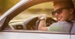 young-man-smiling-driving-car-in-hot-weather-sunset320x170.jpg