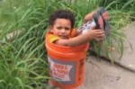 this-video-of-a-little-boy-stuck-in-a-bucket-will-1-16258-1[...].jpg