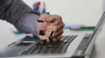 stressed-businessman-smashing-breaking-computer-keyboard-wi[...].png