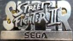 1199px-SuperStreetFighterIIBadge.jpg