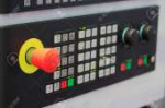 48204194-cnc-machine-control-panel-with-emergency-stop-butt[...].jpg