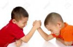 6838227-kids-arm-wrestling-six-and-eight-years-old.jpg