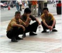 squatting-men-beijing-wangfujing.jpg