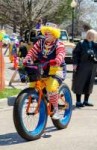happy-clown-bike-small-town-parade-rides-as-participates-st[...].jpg