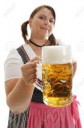 7779949-Bavarian-Woman-holding-Oktoberfest-beer-in-front-dr[...].jpg