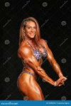 sizzling-hot-redhead-woman-bodybuilder-sexy-amy-morganti-displays-curvaceous-muscular-body-as-competes-women-s-76593216.jpg