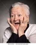 stock-photo-portrait-of-surprised-old-woman-on-a-gray-backg[...].jpg