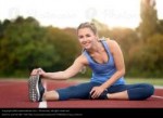 1790839-happy-fit-young-woman-doing-stretching-exercises-ph[...].jpeg