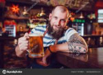 depositphotos141159624-stock-photo-bearded-barman-with-tatt[...].jpg