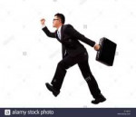 businessman-running-with-suitcase-C11B19.jpg