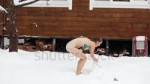 stock-footage-girl-in-a-swimsuit-washes-with-snow-in-winter[...].webm