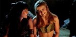 Xena-and-Gabrielle-nudging-each-other-xena-warrior-princess[...].gif