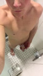 Showering in a gym with my cock cage.mp4