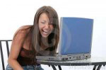 beautiful-young-woman-laptop-computer-laughing-200251.jpg