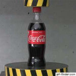 Coca-Cola-under-Hydraulic-Press.gif