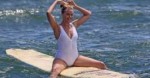 PAY-PROD-22072016-Margot-Robbie-surfing.jpg