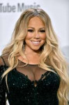 mariah-carey-poses-in-the-press-room-during-the-2018-americ[...].jpg