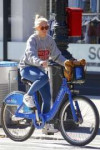 sienna-miller-riding-a-citi-bike-in-nyc-10-12-2018-6.jpg