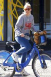 sienna-miller-riding-a-citi-bike-in-nyc-10-12-2018-3.jpg