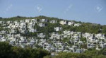 17585492-white-bodrum-houses-at-the-hill-turkey.jpg