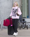 elle-fanning-at-airport-in-toronto-08-05-2019-0.jpg