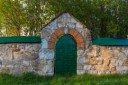 limestone fence with iron riveted wicket