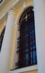 Church window with a sky reflecting in it1.jpg