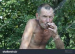 stock-photo-old-man-smoking-295602875.jpg